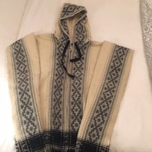 Cream and black hooded poncho